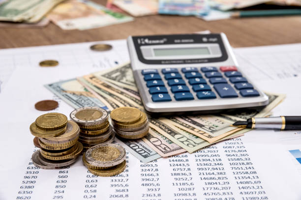 istock Financial report values with dollars, calculator. 649242960