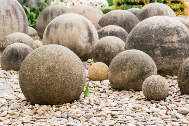 Zen stone in a Japanese garden, Stone sphere in the stone garden with footpath