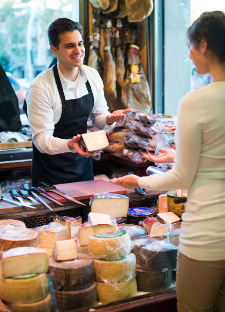 istock Customer buying cheese for dessert 649281732