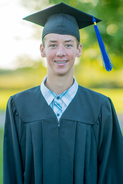istock Teenage Boy Graduating From High School 649286440