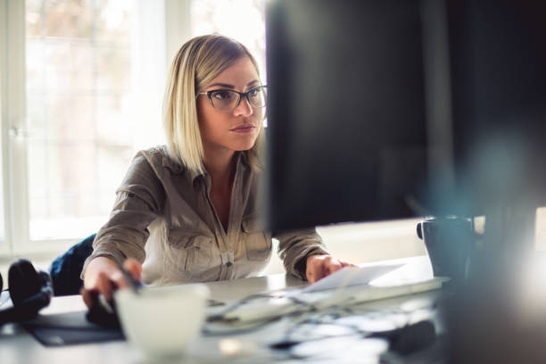 istock Businesswoman at office 649294858