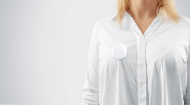 istock Blank button badge mockup pinned on the womans chest 649300910