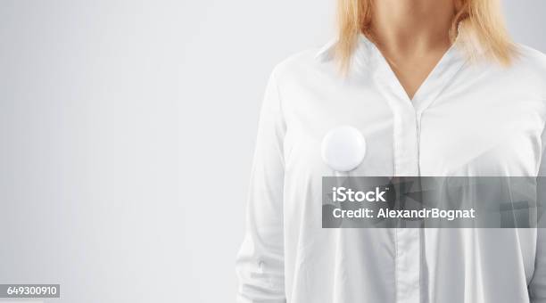 Blank Button Badge Mockup Pinned On The Womans Chest Stock Photo - Download Image Now