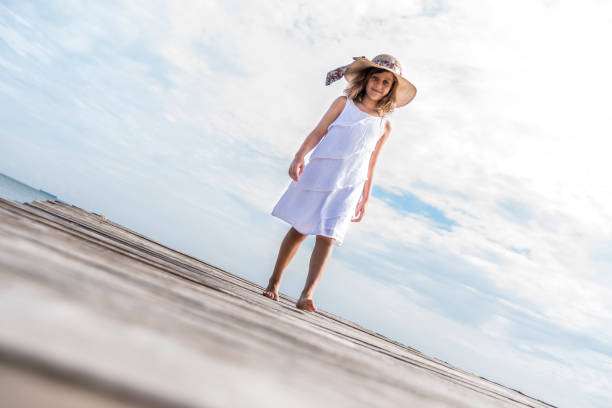 istock Girl on the pier 649301868