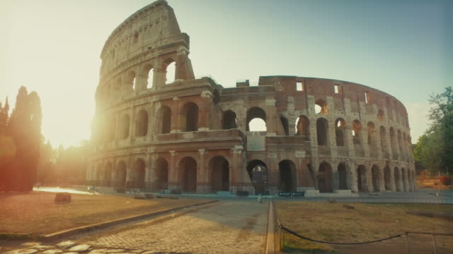 Coliseum of Rome with warm sun at early morning