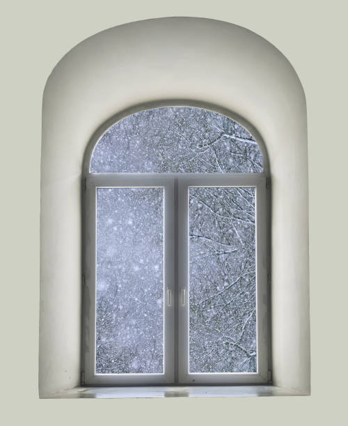 istock white semicircular modernist windows on a black wall
winter, snow, snowstorm, snowfall in the window 649303812