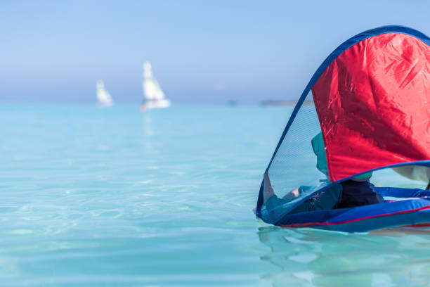 istock Baby Boy Playing in Wayer on Tropical Beach, Cuba 649309830