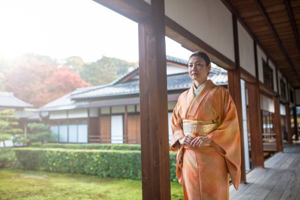istock Woman in a Kimono exploring a Japanese Temple 649313490