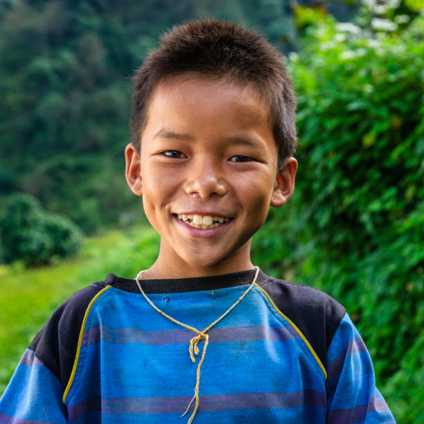 Happy Nepalese boy near Annapurna Range