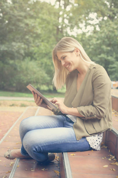 istock Woman in the park. 649327886