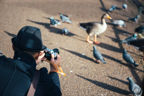 Man taking photo at St James Park