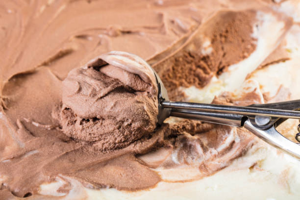 istock Spoon with ice cream closeup 649356060