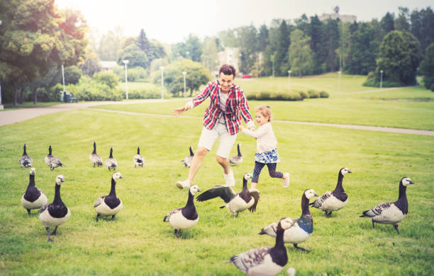istock Father and daughter having fun in summer day. 649356528