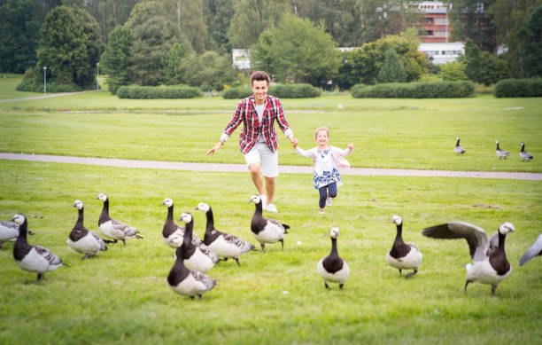 istock Father and daughter having fun in summer day. 649356566