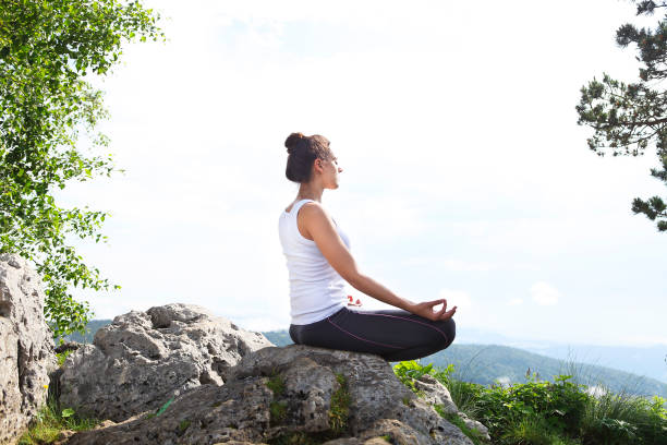 istock Attractive young woman doing a yoga pose 649363074
