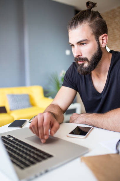 istock Owner of a small business multitasking at home 649369826