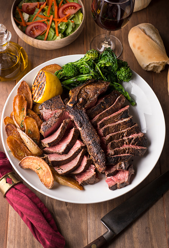 Porter House Steak with Roasted Fingerling Potatoes and Broccoli Rabe