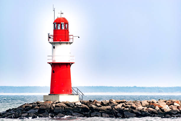 istock The mole in Warnemuende. Lighthouse in Rostock 649374152