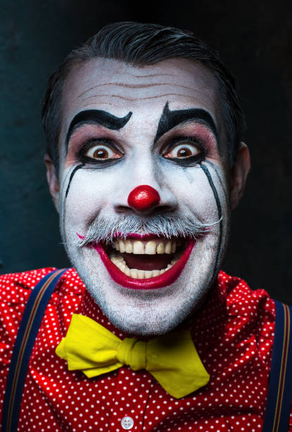 istock Terrible crazy clown and Halloween theme 649376352