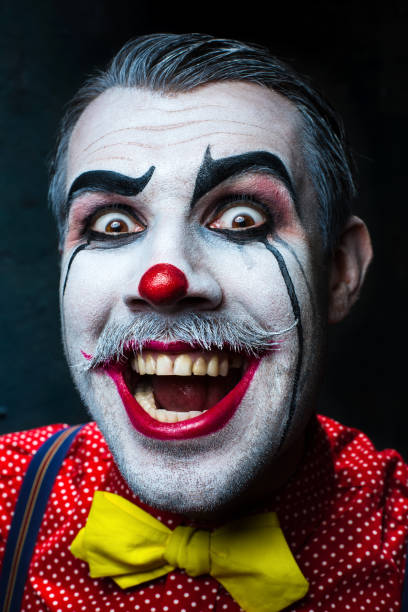 istock Terrible crazy clown and Halloween theme 649376444