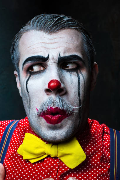 istock Terrible crazy clown and Halloween theme 649377030