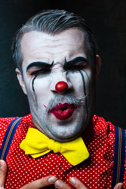 istock Terrible crazy clown and Halloween theme 649377112