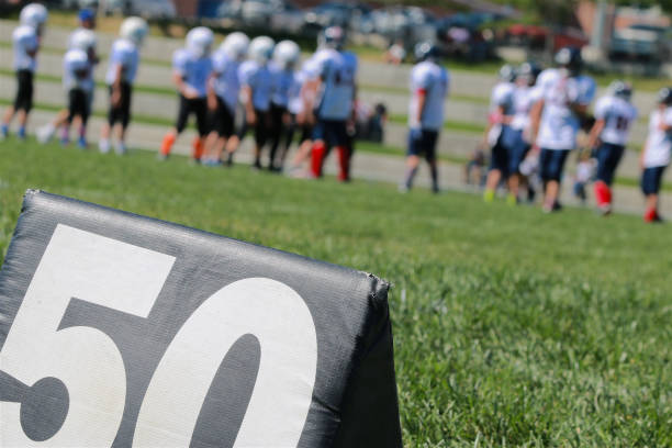 linia 50-cio jardowa - football child american football team zdjęcia i obrazy z banku zdjęć