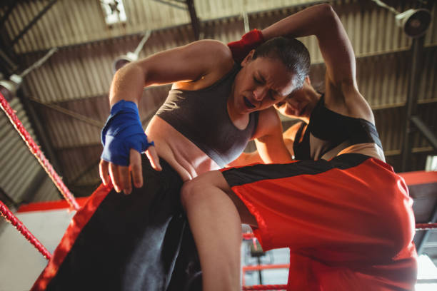 istock Female boxers fighting in boxing ring 649394992