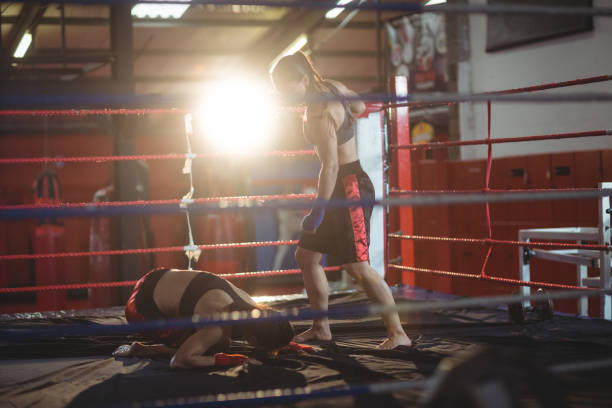 istock Female boxers fighting in boxing ring 649395032
