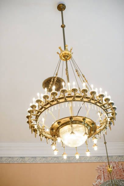istock Golden chandelier from below 649411182