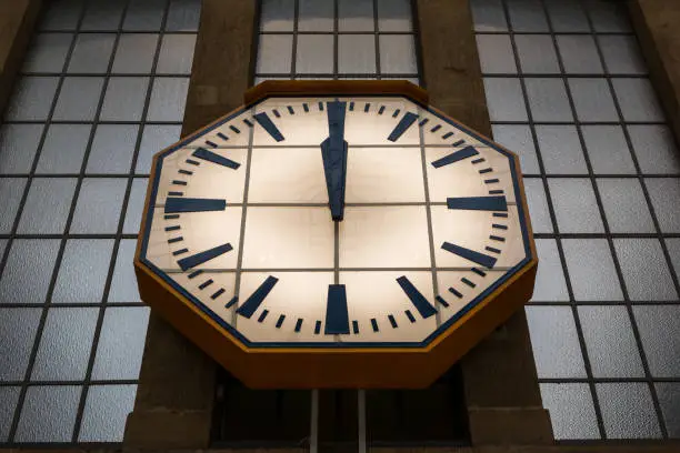 Large Stone Wall Clock Windows Glass Train Station Hands Midday 12 o Clock Glowing Face Hands