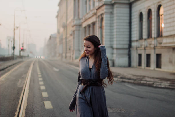 istock Girl looking back on the road 649422746