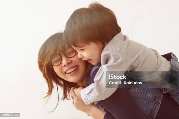 Warm Family Relations Stock Photo - Download Image Now - Dental Braces, Mother, Child