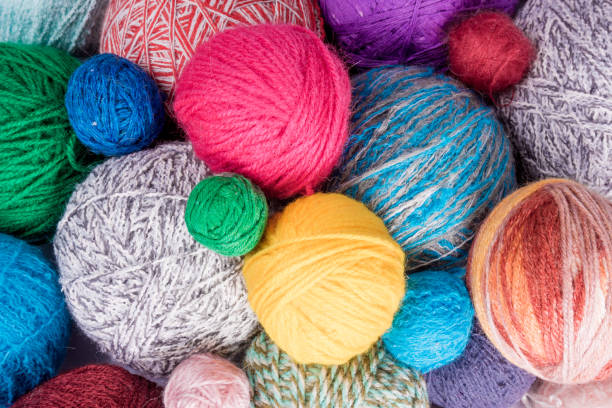istock wool yarn ball. Colorful threads for needlework. Colorful fabric texture background 649424956