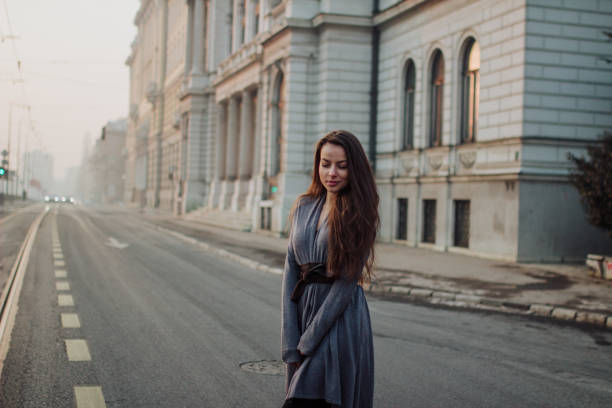 istock Girl looking back on the road 649425306