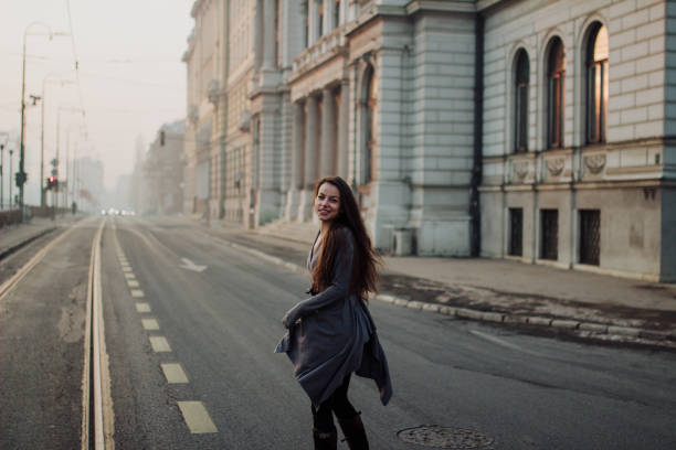 istock Girl looking back on the road 649427598