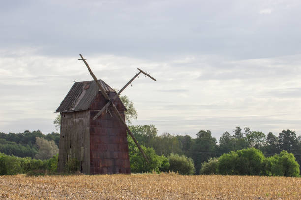 istock Kawnice, Poland. Old ruined windmill on the field. 649429726