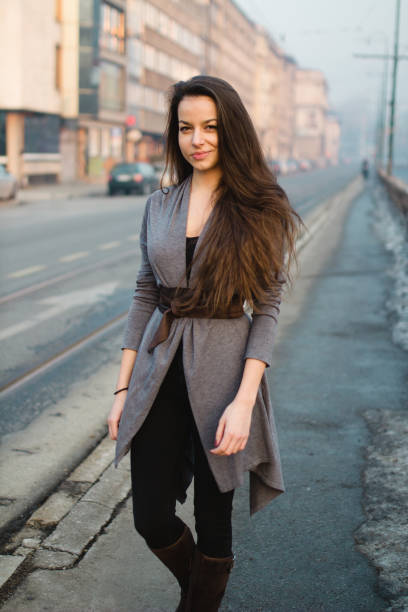 istock Girl walking on the road 649435740