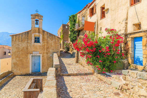 Typical church in small Corsican village of Sant' Antonino, Corsica, France stock photo