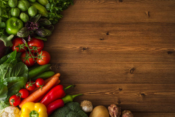 istock Healthy Organic Vegetables on a Wooden Background 649458500