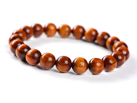 A traditional wood beaded Japanese bracelet made from 1,000 year old wood from Yakushima island in Southern Japan.