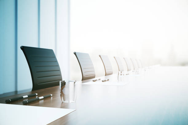 Conference table closeup Close of up table with equipment in conference room. 3D Rendering meeting room stock pictures, royalty-free photos & images
