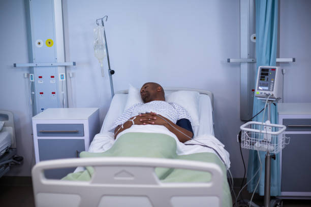 istock Male patient resting in ward 649496650