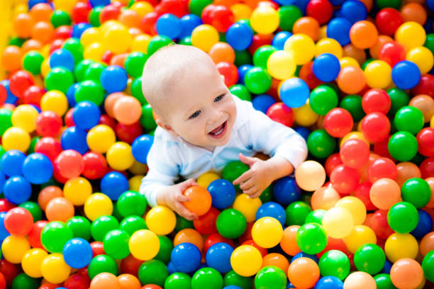 istock Child playing in ball pit on indoor playground 649503052