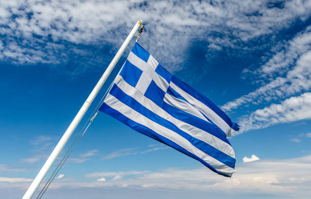 istock National flag of Greece on flagpole 649507134