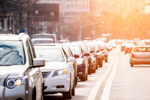 istock Congested lane with queue of cars 649518110