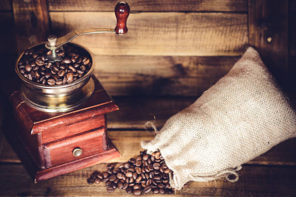 istock Coffee Mill Cup and burlap with coffee bean sack 649523814