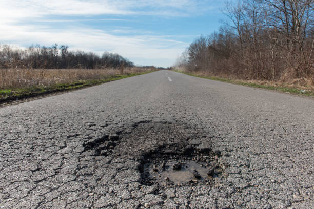 istock Dangerous Pot Hole on the Road 649529030