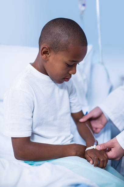 istock Doctor examining a child 649544864