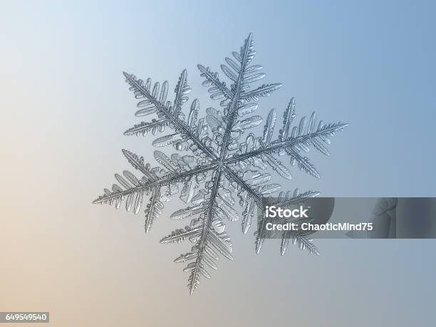 Snowflake Sparkling On Bright Gradient Background Stock Photo - Download Image Now - Abstract, Backgrounds, Beauty